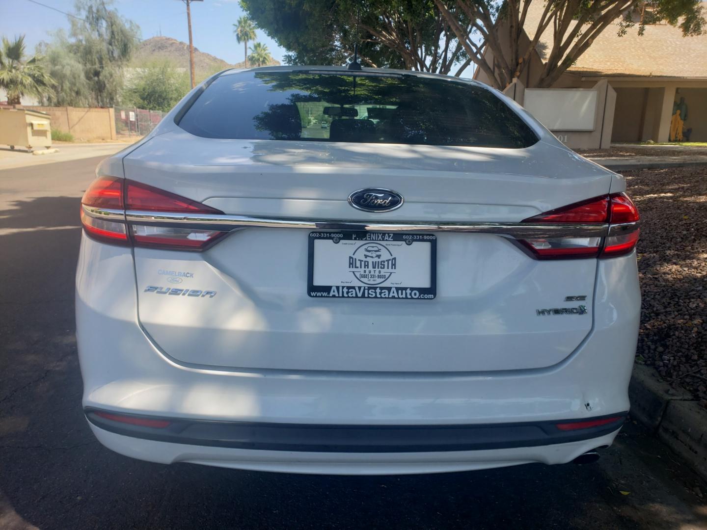 2017 WHITE /black Ford Fusion Hybrid SE hybrid (3FA6P0LUXHR) with an 2.4L L4 DOHC 16V engine, 6-Speed Automatic transmission, located at 323 E Dunlap Ave., Phoenix, AZ, 85020, (602) 331-9000, 33.567677, -112.069000 - 2017 Ford Fusion Hybrid SE,......EXCELLENT condition, A Real Must See!!.... No accidents, Power everything, Stereo/cd player, Phone sync, Bluetooth, Satellite compatible, Ice cold ac, Clean Black interior with Black cloth seats in near perfect condition, power windows, power door locks, Gorgeous tin - Photo#7